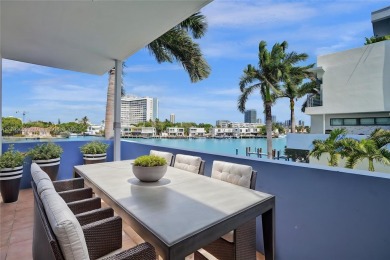 MOTIVATED SELLER!! Rare Bayfront Townhome with 30ft Boat Dock in on Normandy Shores Golf Course in Florida - for sale on GolfHomes.com, golf home, golf lot
