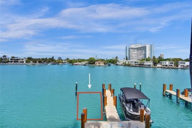 MOTIVATED SELLER!! Rare Bayfront Townhome with 30ft Boat Dock in on Normandy Shores Golf Course in Florida - for sale on GolfHomes.com, golf home, golf lot