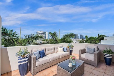 MOTIVATED SELLER!! Rare Bayfront Townhome with 30ft Boat Dock in on Normandy Shores Golf Course in Florida - for sale on GolfHomes.com, golf home, golf lot
