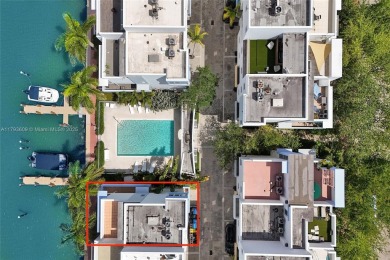 MOTIVATED SELLER!! Rare Bayfront Townhome with 30ft Boat Dock in on Normandy Shores Golf Course in Florida - for sale on GolfHomes.com, golf home, golf lot