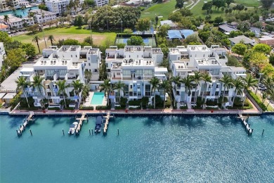 MOTIVATED SELLER!! Rare Bayfront Townhome with 30ft Boat Dock in on Normandy Shores Golf Course in Florida - for sale on GolfHomes.com, golf home, golf lot