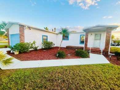 Welcome to this beautiful 2-bedroom, 2-bathroom home nestled in on Pine Lakes Country Club in Florida - for sale on GolfHomes.com, golf home, golf lot