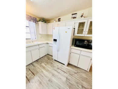 Welcome to this beautiful 2-bedroom, 2-bathroom home nestled in on Pine Lakes Country Club in Florida - for sale on GolfHomes.com, golf home, golf lot
