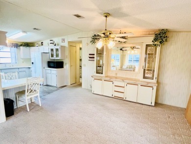 Welcome to this beautiful 2-bedroom, 2-bathroom home nestled in on Pine Lakes Country Club in Florida - for sale on GolfHomes.com, golf home, golf lot