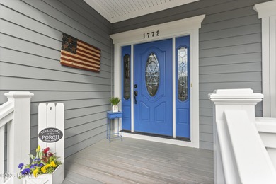 Southern Low-Country custom-built home sits in a quiet on Carolina National Golf Club in North Carolina - for sale on GolfHomes.com, golf home, golf lot