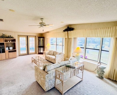 Welcome to this beautiful 2-bedroom, 2-bathroom home nestled in on Pine Lakes Country Club in Florida - for sale on GolfHomes.com, golf home, golf lot