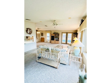 Welcome to this beautiful 2-bedroom, 2-bathroom home nestled in on Pine Lakes Country Club in Florida - for sale on GolfHomes.com, golf home, golf lot