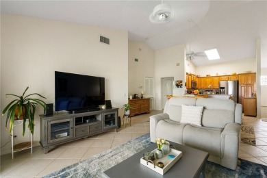 Feel the spaciousness created by the vaulted ceilings, generous on The American Golf Club in Florida - for sale on GolfHomes.com, golf home, golf lot