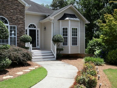 Very attractive, Great curb appeal, lovely landscaping is your on Creekside Golf and Country Club in Georgia - for sale on GolfHomes.com, golf home, golf lot