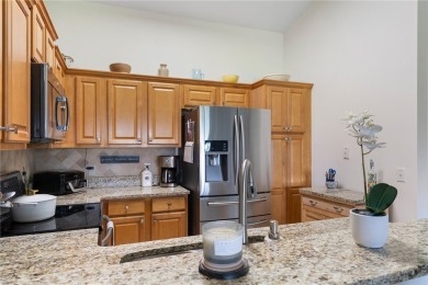 Feel the spaciousness created by the vaulted ceilings, generous on The American Golf Club in Florida - for sale on GolfHomes.com, golf home, golf lot