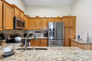 Feel the spaciousness created by the vaulted ceilings, generous on The American Golf Club in Florida - for sale on GolfHomes.com, golf home, golf lot