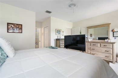 Feel the spaciousness created by the vaulted ceilings, generous on The American Golf Club in Florida - for sale on GolfHomes.com, golf home, golf lot