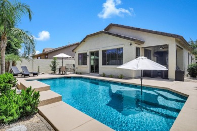 Inviting single-story with 3 beds, 2 baths, open kitchen with on Seville Golf and Country Club in Arizona - for sale on GolfHomes.com, golf home, golf lot