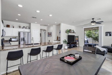 Inviting single-story with 3 beds, 2 baths, open kitchen with on Seville Golf and Country Club in Arizona - for sale on GolfHomes.com, golf home, golf lot