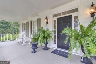 Warning!! This home may cause sudden daydreams of front porch on Whitewater Creek in Georgia - for sale on GolfHomes.com, golf home, golf lot