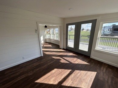 Step into pure tranquility at this exquisite 1-bedroom on Apple Island Golf Course At Apple Island Resort in Vermont - for sale on GolfHomes.com, golf home, golf lot