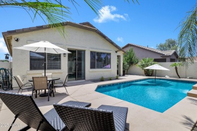 Inviting single-story with 3 beds, 2 baths, open kitchen with on Seville Golf and Country Club in Arizona - for sale on GolfHomes.com, golf home, golf lot