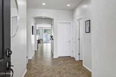 Inviting single-story with 3 beds, 2 baths, open kitchen with on Seville Golf and Country Club in Arizona - for sale on GolfHomes.com, golf home, golf lot