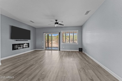 This beautifully maintained and updated Cactus Flower model, is on Cimarron Golf Club in Arizona - for sale on GolfHomes.com, golf home, golf lot