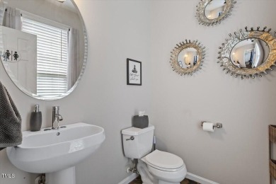 Welcome to this charming two-story residence in the sought-after on Hedingham Golf and Athletic Club in North Carolina - for sale on GolfHomes.com, golf home, golf lot