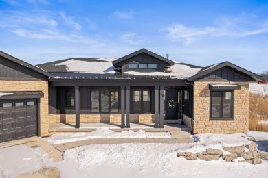 This stunning 4-bedroom ranch, plus office/den and 3 bathrooms on Bishops Bay Country Club in Wisconsin - for sale on GolfHomes.com, golf home, golf lot