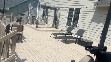 Welcome to this charming two-story residence in the sought-after on Hedingham Golf and Athletic Club in North Carolina - for sale on GolfHomes.com, golf home, golf lot