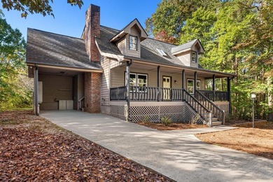 Welcome to this beautifully renovated cedar-sided Cape Cod on The Trail At Chickasaw Pointe in South Carolina - for sale on GolfHomes.com, golf home, golf lot