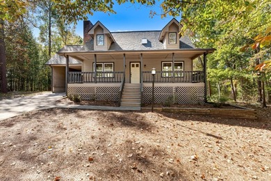 Welcome to this beautifully renovated cedar-sided Cape Cod on The Trail At Chickasaw Pointe in South Carolina - for sale on GolfHomes.com, golf home, golf lot
