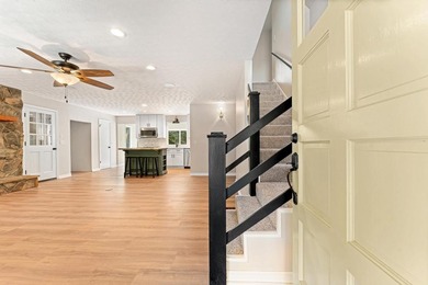 Welcome to this beautifully renovated cedar-sided Cape Cod on The Trail At Chickasaw Pointe in South Carolina - for sale on GolfHomes.com, golf home, golf lot