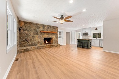 Welcome to this beautifully renovated cedar-sided Cape Cod on The Trail At Chickasaw Pointe in South Carolina - for sale on GolfHomes.com, golf home, golf lot