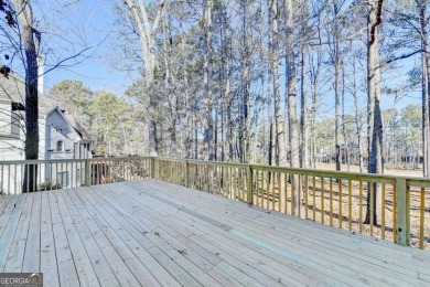 Welcome to this beautifully renovated 5-bedroom, 3.5-bathroom on Brookstone Golf and Country Club in Georgia - for sale on GolfHomes.com, golf home, golf lot