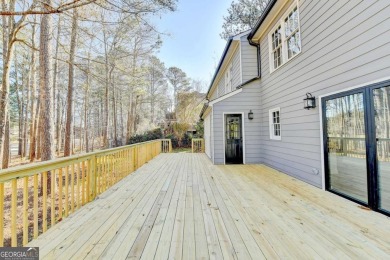 Welcome to this beautifully renovated 5-bedroom, 3.5-bathroom on Brookstone Golf and Country Club in Georgia - for sale on GolfHomes.com, golf home, golf lot