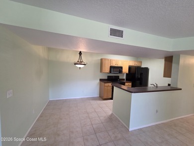 Easy living at The Greens at Viera East. This 1st floor condo on Viera East Golf Club in Florida - for sale on GolfHomes.com, golf home, golf lot