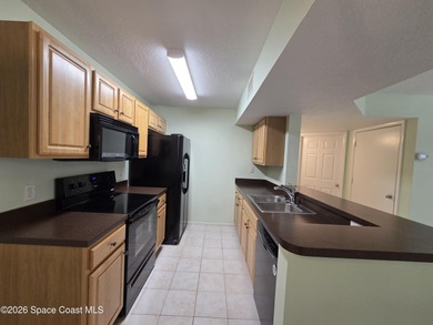 Easy living at The Greens at Viera East. This 1st floor condo on Viera East Golf Club in Florida - for sale on GolfHomes.com, golf home, golf lot