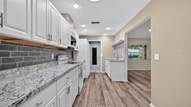 This fully updated 2 bedroom, 2 bathroom villa is located in the on Heather Golf and Country Club in Florida - for sale on GolfHomes.com, golf home, golf lot