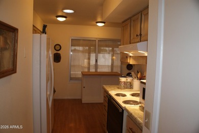 Discover this expanded Woodbury model featuring 2 bedrooms, each on Deer Valley Golf Course in Arizona - for sale on GolfHomes.com, golf home, golf lot