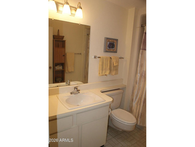 Discover this expanded Woodbury model featuring 2 bedrooms, each on Deer Valley Golf Course in Arizona - for sale on GolfHomes.com, golf home, golf lot