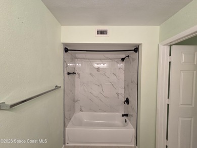 Easy living at The Greens at Viera East. This 1st floor condo on Viera East Golf Club in Florida - for sale on GolfHomes.com, golf home, golf lot