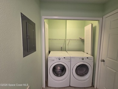 Easy living at The Greens at Viera East. This 1st floor condo on Viera East Golf Club in Florida - for sale on GolfHomes.com, golf home, golf lot