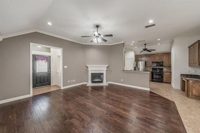 Move-in ready and full of charm, this 3-bedroom, 2-bathroom home on WaterChase Golf Club in Texas - for sale on GolfHomes.com, golf home, golf lot