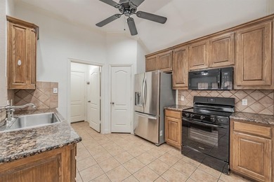 Move-in ready and full of charm, this 3-bedroom, 2-bathroom home on WaterChase Golf Club in Texas - for sale on GolfHomes.com, golf home, golf lot