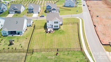 Welcome to 12001 Sam Snead Ct. This stunning home sits on a on Edgewater Golf Club in South Carolina - for sale on GolfHomes.com, golf home, golf lot
