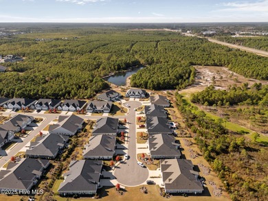 This beautiful townhome is situated on a corner lot located in on Members Club At St. James Plantation in North Carolina - for sale on GolfHomes.com, golf home, golf lot