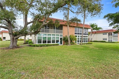 A rare gem! This 1st-floor end-unit sits in a unique Non-55+ on The American Golf Club in Florida - for sale on GolfHomes.com, golf home, golf lot