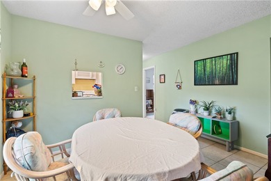 A rare gem! This 1st-floor end-unit sits in a unique Non-55+ on The American Golf Club in Florida - for sale on GolfHomes.com, golf home, golf lot