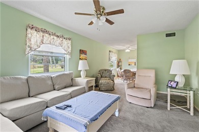 A rare gem! This 1st-floor end-unit sits in a unique Non-55+ on The American Golf Club in Florida - for sale on GolfHomes.com, golf home, golf lot