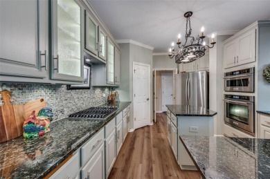 Nestled in the heart of Coppell, this beautifully renovated on Riverchase Golf Club in Texas - for sale on GolfHomes.com, golf home, golf lot