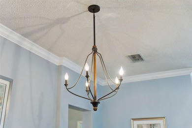 Searching for a 3-bed ranch home in Davenport at $360,000 with a on Polo Park East in Florida - for sale on GolfHomes.com, golf home, golf lot