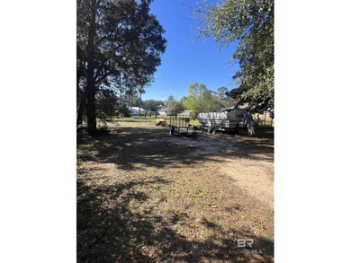 Beautiful high & dry lot with deeded lagoon access. Barely over on The Golf Club of the Wharf in Alabama - for sale on GolfHomes.com, golf home, golf lot