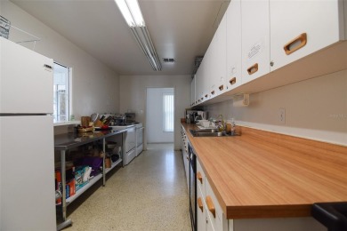 IMPROVED PRICE! THIS FABULOUS 55+ VILLA IN SEMINOLE'S HIGHLY on Bayou Golf Club in Florida - for sale on GolfHomes.com, golf home, golf lot